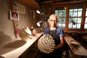 Jennifer McCurdy with a finished piece