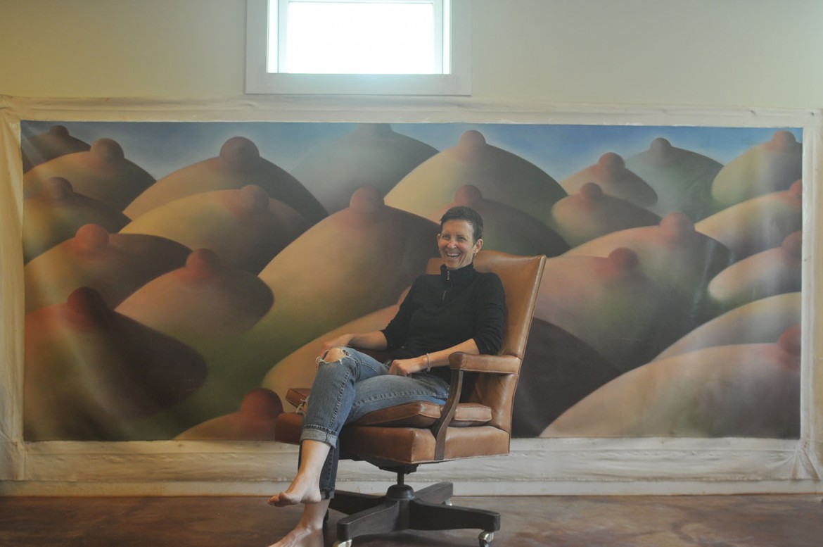Lisa in front of her painting Purple Mountain Majesty, oil on canvas, 11 x 4.6 
