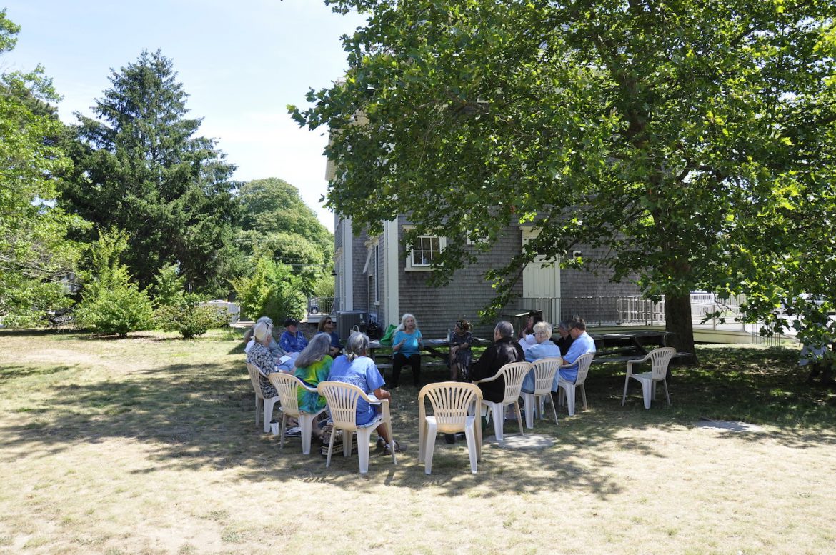 Niki Patton leading a session of Writers Read behind the Grange Hall in 2015