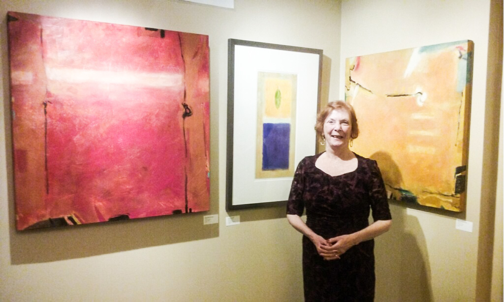 Diane McManus Jensen in front of work by Marie Louis Rouff at the Union League Club in NYC. —Gwyn McAllister