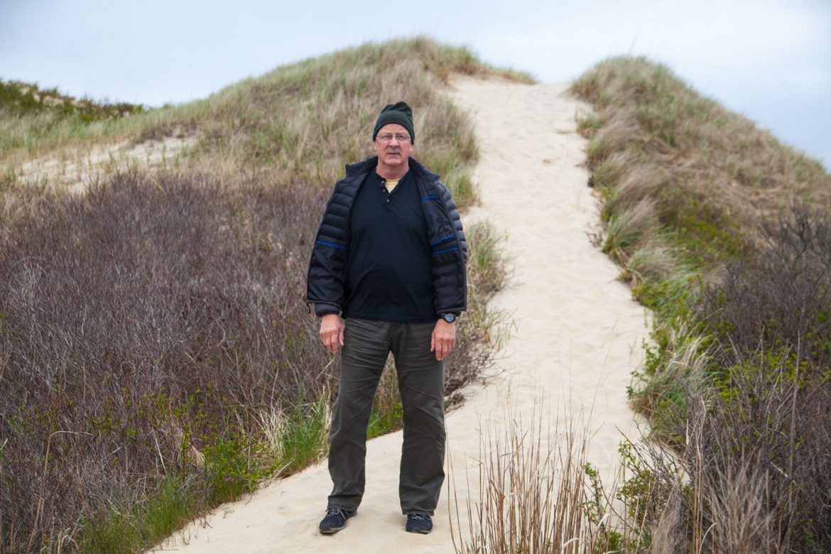 Neal Rantoul on the dunes at Philbin Beach in Aquinnah. —Sam Moore